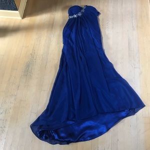 Strapless keyhole ball gown with a train